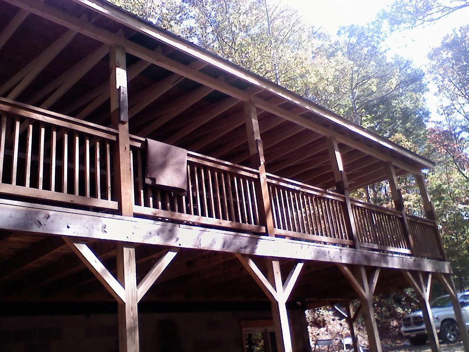Timber framing under a new elevated porch and deck — Roof Leak Repair in Post by Roofing Brothers